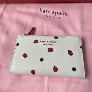 Kate Spade slim bifold wallet - lady bugs dots